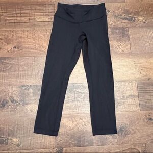 Lululemon Womens cropped black leggings Sz 8 stretchy hidden pocket